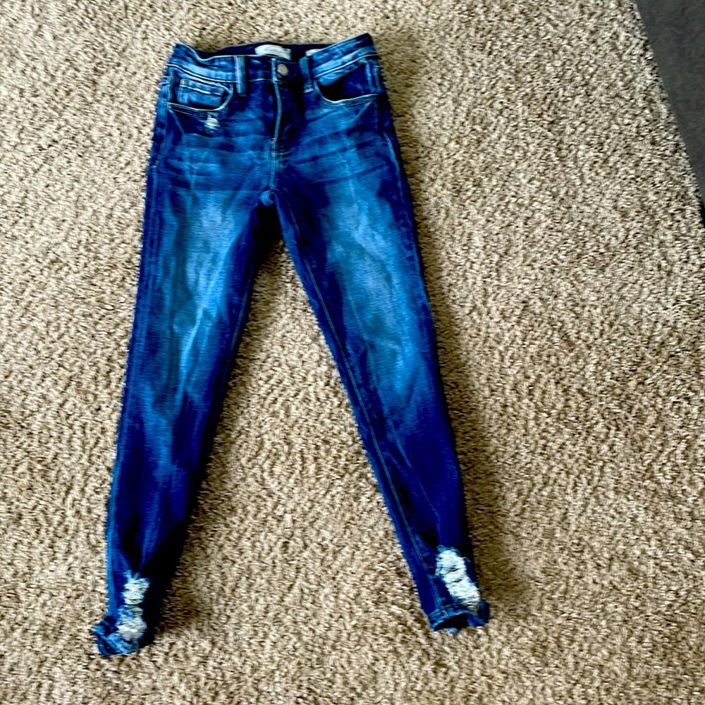 New never worn. Distressed, mid-rise, slim fit, ankle skinny.